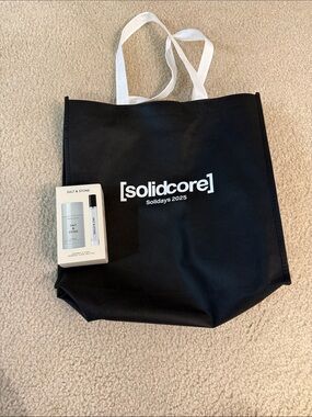 [solidcore] Black Tote Bag with White Logo and Straps with salt and stone produc